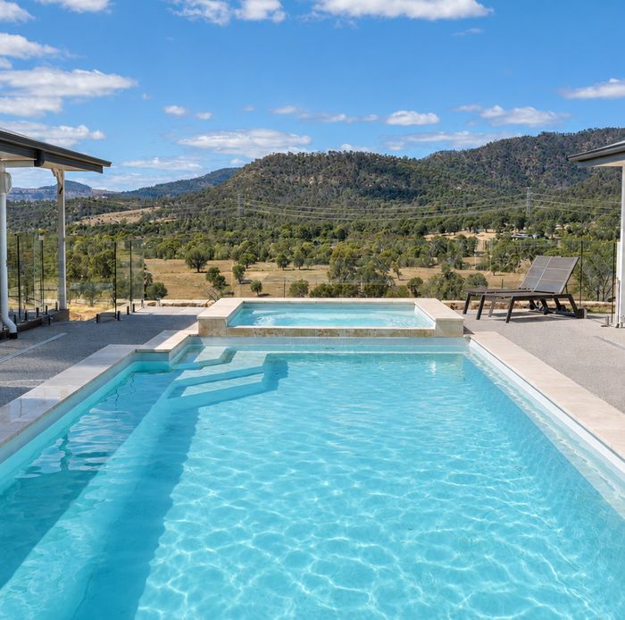 Aqua Mist pool with mountain views