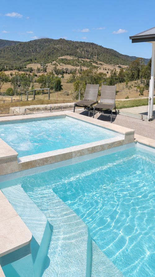 Fibreglass pool on a hillside property